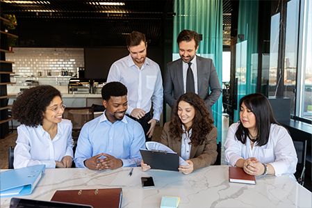 A group of professional individuals standing together, representing the management team, dressed in formal business attire and exuding confidence and leadership